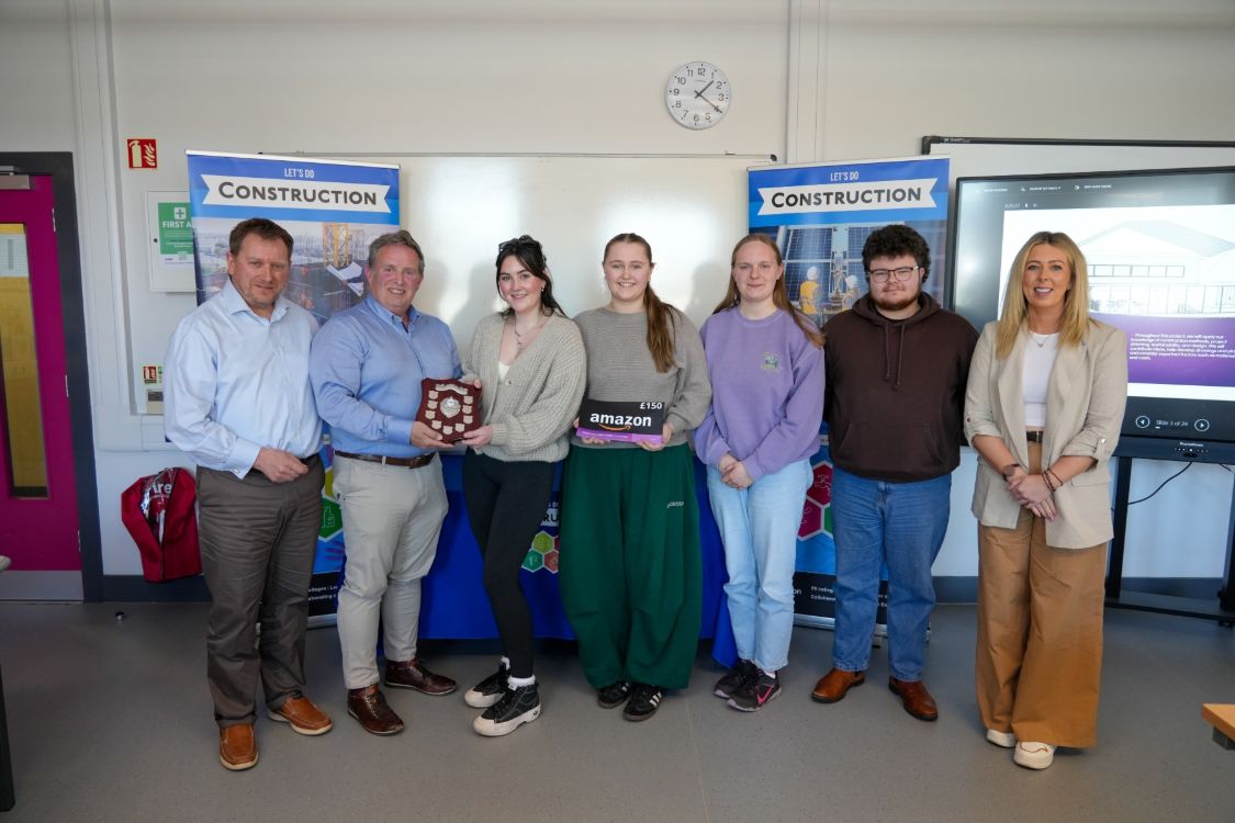 Picture of first place engineering group with judges